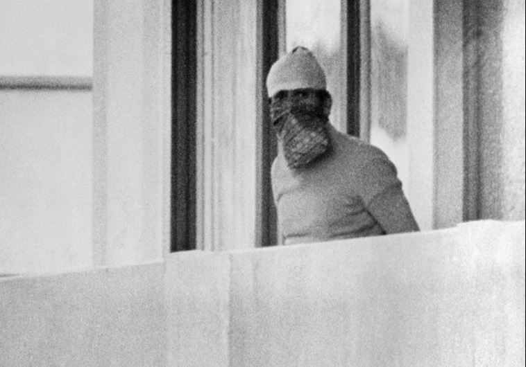 A member of the Palestinian terrorist group Black September appears on the balcony of the Israeli house at the Munich Olympic village on September 5, 1972 A member of the Palestinian terrorist group Black September appears on the balcony of the Israeli house at the Munich Olympic village on September 5, 1972