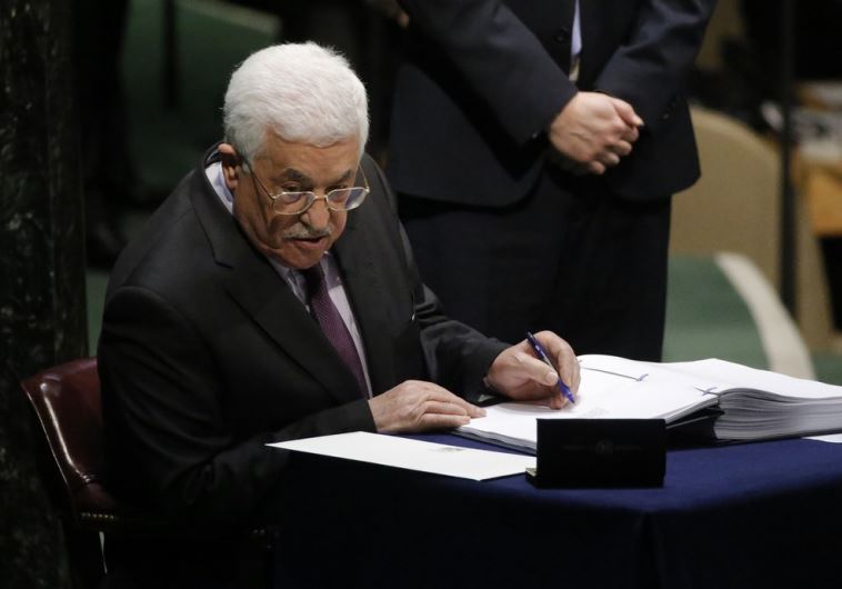 Palestinian Authority President Mahmoud Abbas signs the Paris Agreement on climate change at UN headquarters in New York Palestinian Authority President Mahmoud Abbas signs the Paris Agreement on climate change at UN headquarters in New York